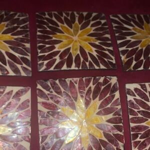 Purple and gold coasters